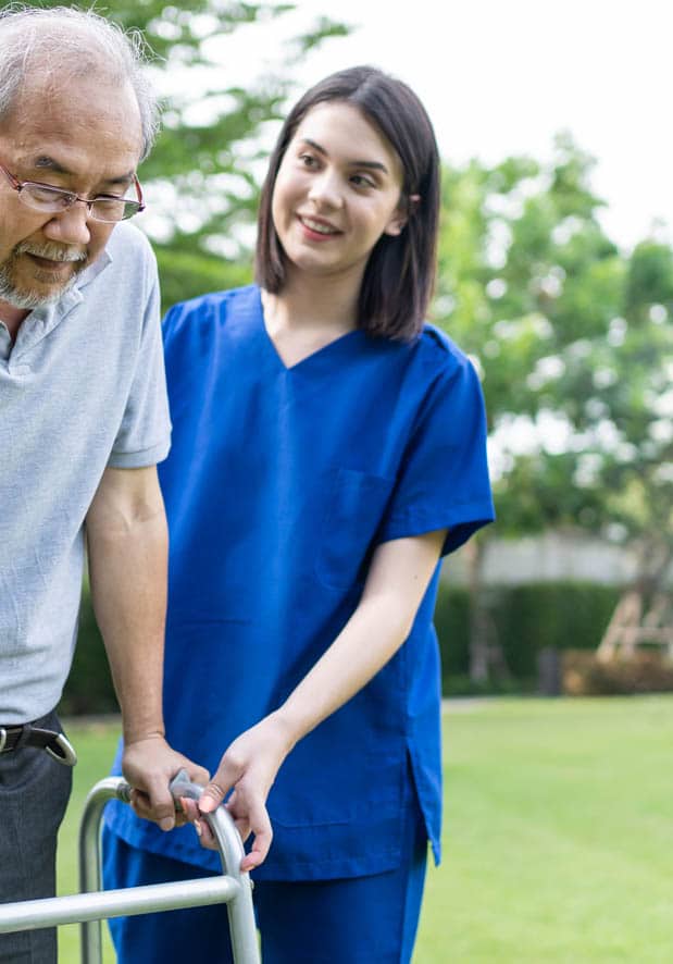 nurse is helping an older man photo